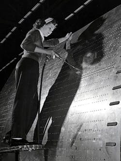 A riveter works on a B-24 bomber at Ford's Willow Run plant during World War II. A riveter works on a B-24 bomber at Ford's Willow Run plant during World War II.