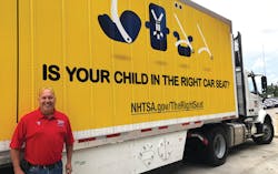 YRC Worldwide has invested in wraps to promote industry events, such as Child Passenger Safety Week. Steve Fields, a YRC Freight driver, stands by a wrapped trailer. YRC Worldwide has invested in wraps to promote industry events, such as Child Passenger Safety Week. Steve Fields, a YRC Freight driver, stands by a wrapped trailer.