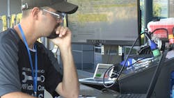 Truck technican Kyle Ballard troubleshoots an issue during DTNA's 2019 skills competition. Truck technican Kyle Ballard troubleshoots an issue during DTNA's 2019 skills competition.