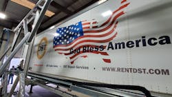 The VAR process involves positioning the vehicle in front of a giant printer that operates on a vertical flatbed frame, where inkjet nozzles traverse on a carriage to robotically paint the vehicle from top to bottom. The VAR process involves positioning the vehicle in front of a giant printer that operates on a vertical flatbed frame, where inkjet nozzles traverse on a carriage to robotically paint the vehicle from top to bottom.