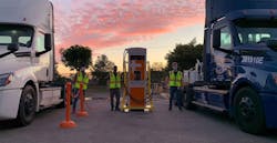 Dtna Electric Trucks Charging With People Dtna Electric Trucks Charging With People