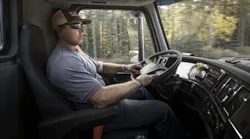 Truck Driver In Cab Volvo Trucks North Amerca