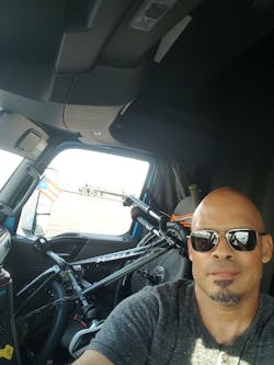Velazquez keeps his bike in the cab to help break up his various fitness exercises throughout the day.