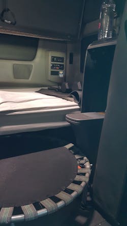 Inside Velazquez's truck; the mini trampoline stored under the sleeper bed for easy access during the day. Inside Velazquez's truck; the mini trampoline stored under the sleeper bed for easy access during the day.
