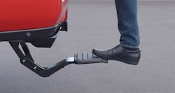 The retractable Mopar step assists access to the Ram bed. The retractable Mopar step assists access to the Ram bed.