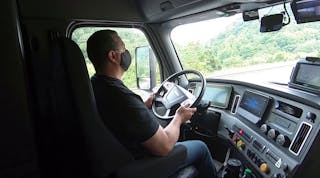 Truck Driver Wearing Mask In Cab Torc Robotics