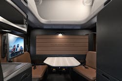 Freightliner Cascadia&apos;s optional driver lounge features a dual-seat dining area.