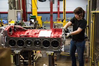 A Cummins worker at the Jamestown Engine Plant in Jamestown, N.Y. assembles a X12 engine, which was launched in 2018 to offer customers a more modest displacement (11.8L) than the X15 (14.9L). The X12 is currently available with Freightliner, Western Star, Autocar, Oshkosh, Terex and several other specialty truck manufacturers.