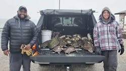 Will Bellamy (left) and his son Jerome (right) rescued sea turtles off the short of Texas. Will Bellamy (left) and his son Jerome (right) rescued sea turtles off the short of Texas.