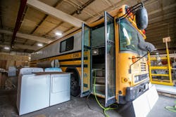Each bus has two showers, a washer, dryer and couches and can house about eight people at a time. Each bus has two showers, a washer, dryer and couches and can house about eight people at a time.