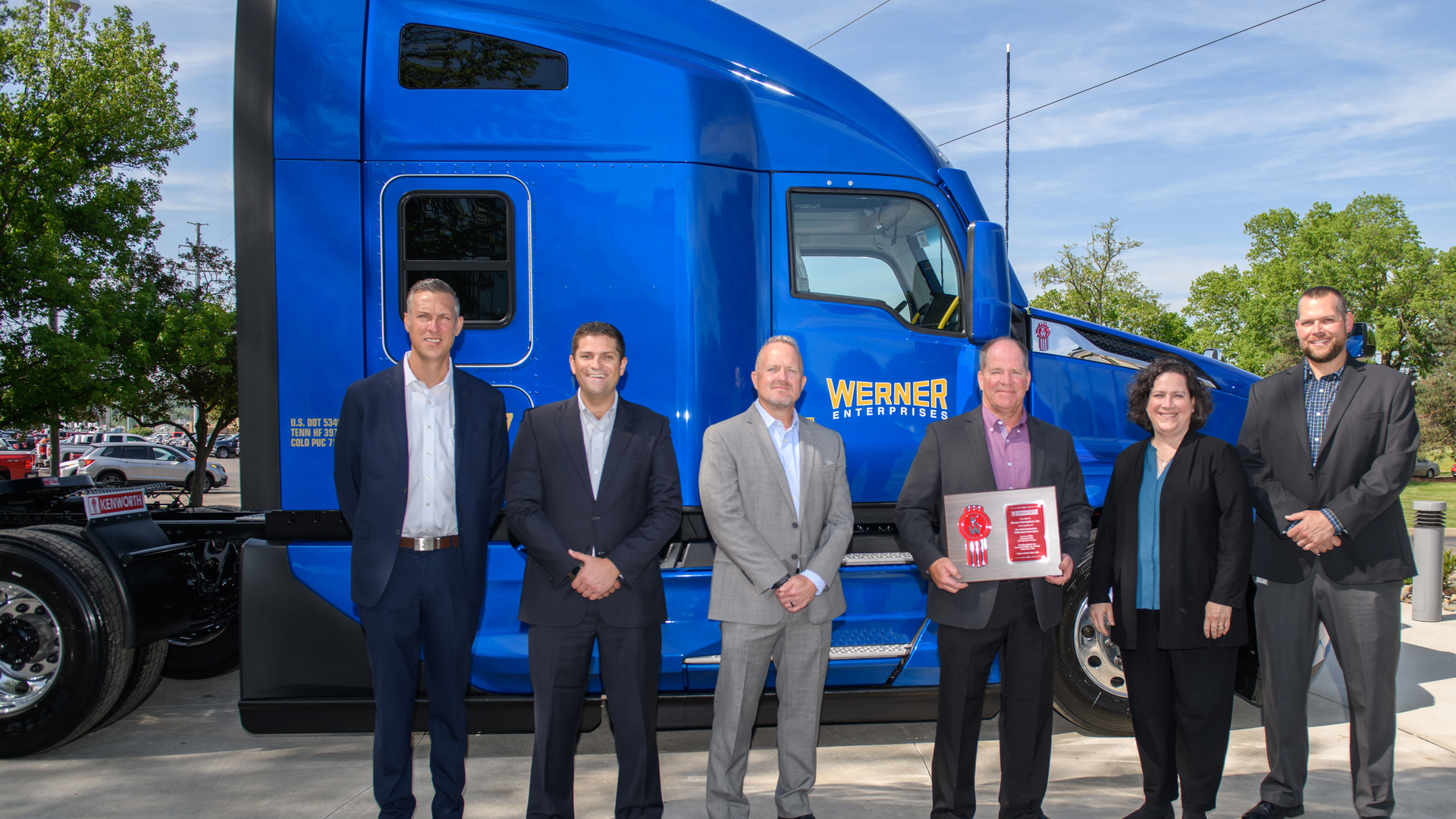 From left: Matt Stricker, Kenworth senior national accounts manager; Corey Murphy, VP of MHC Kenworth Iowa/Nebraska/Illinois, representing selling dealer MHC Kenworth &ndash; Omaha; Tony Wahl, Werner Enterprises director of equipment purchasing; Scott Reed, Werner Enterprises SVP of equipment purchasing and maintenance; Laura Bloch, Kenworth assistant general manager for sales and marketing; and John Long, Kenworth national fleet service manager.