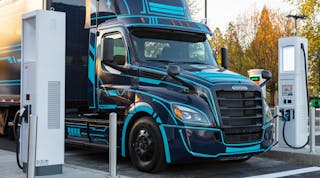 Freightliner eCascadia charges at Duck Island charging station in Portland, Ore.