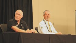 From left, Clark Reed, company driver and trainer for Nussbaum Transportation, and Henry Albert, owner of Albert Transport, discuss safety perspectives from the driver&apos;s seat during TCA&apos;s Safety &amp; Security Meeting in St. Louis.