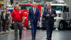 UAW Local 677 Shop Chairman Kevin Fronheiser, left, President Joe Biden, and Martin Weissburg, Mack Trucks president, tour Mack’s LVO facility. UAW Local 677 Shop Chairman Kevin Fronheiser, left, President Joe Biden, and Martin Weissburg, Mack Trucks president, tour Mack’s LVO facility.