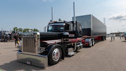 Best of Show winner Kiegen Nelson and Vinnie Diorio of Richfield, Wisconsin shows off the 2020 Peterbilt 389 at Shell Rotella's 2021 SuperRigs event. Best of Show winner Kiegen Nelson and Vinnie Diorio of Richfield, Wisconsin shows off the 2020 Peterbilt 389 at Shell Rotella's 2021 SuperRigs event.