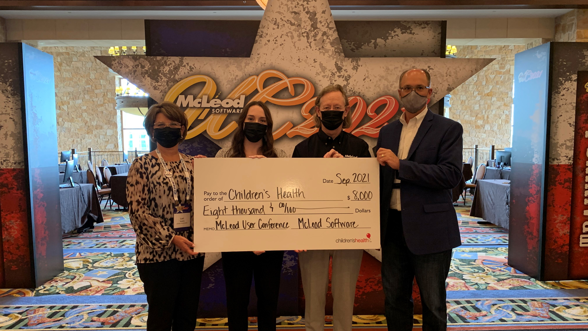 From left: Hoesktra Transportation's Lori Teders; Children&rsquo;s Medical Center Foundation Development Officer, Corporate Partnerships Kendall Rowden; McLeod Software&rsquo;s Tom McLeod; Hoesktra Transportation's Steve Hoekstra.