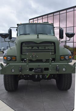 Among the few modifications to the Mack Granite frame, the M917A3 has crossmembers at the front and the back of the truck designed to meet lift and tie-down provisions, for equipment transport.