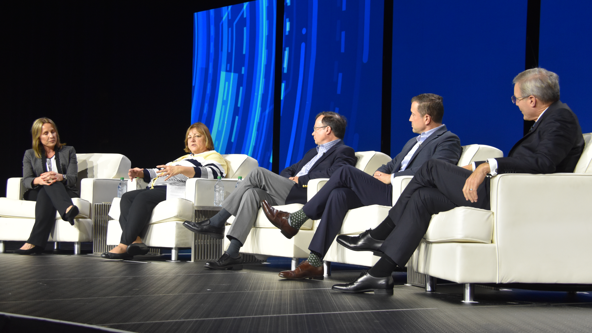 Discussing supply chain challenges during a luncheon session at the ATA convention are, from left, moderator Shelley Simpson, J.B. Hunt; Gail Rutkowski, NASSTRAC; John Butler, World Shipping Council; Ian Jefferies, Association of American Railroads; and Chis Spear, ATA.