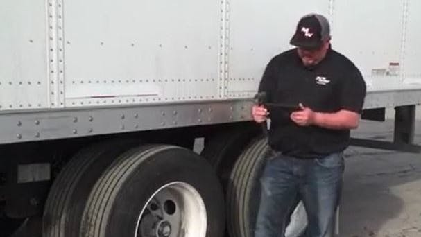 A Peterson PULSE mobile device helps drivers complete pre-trip walk-around inspections