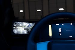 The rear-view camera screen of the Atlis XT. The screens on either side of the steering wheel are positioned within the driver's forward field view for safety. The rear-view camera screen of the Atlis XT. The screens on either side of the steering wheel are positioned within the driver's forward field view for safety.