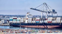 Cargo containers are processed from a ship at the Port of Los Angeles, which with the Port of Long Beach in California processes 40% of all the goods that come in and go out of the U.S. Cargo containers are processed from a ship at the Port of Los Angeles, which with the Port of Long Beach in California processes 40% of all the goods that come in and go out of the U.S.