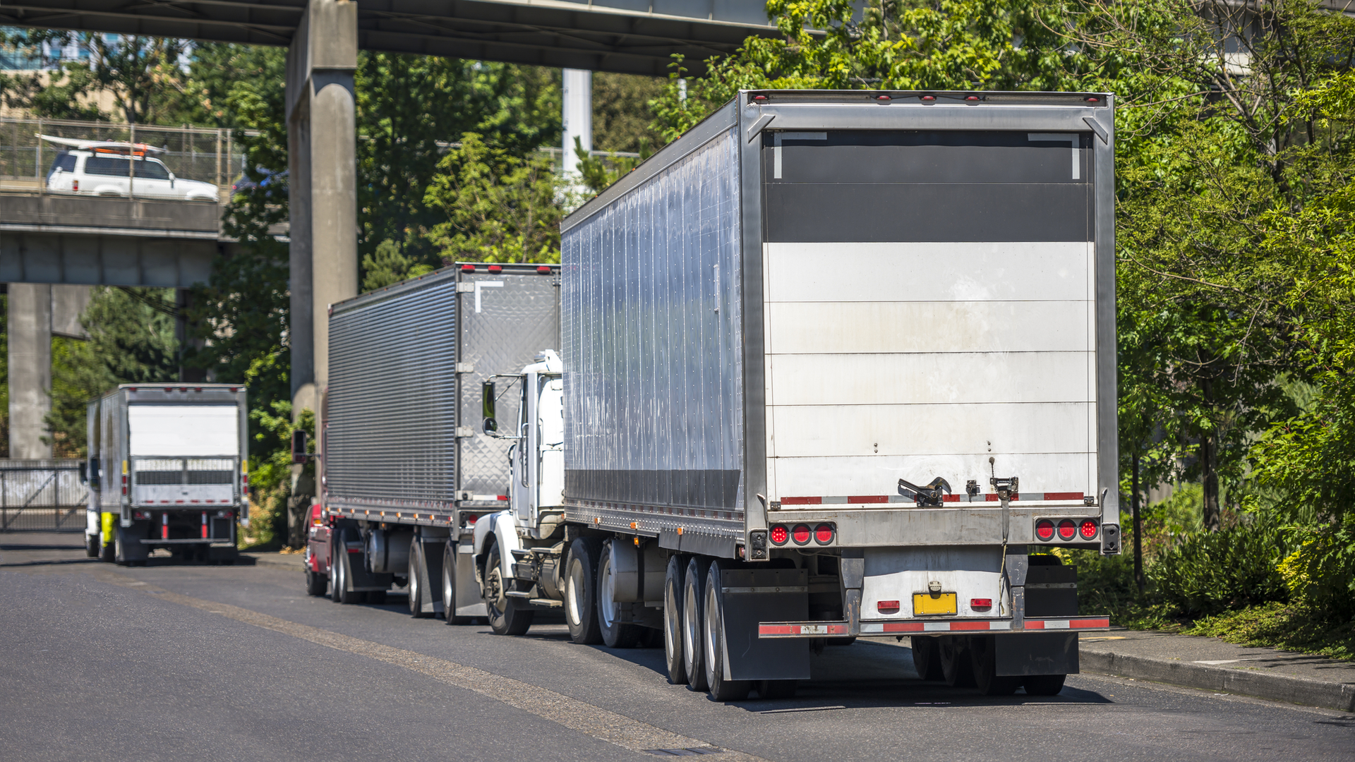 Three Trucks In An Interchange 61b75dd7d4296