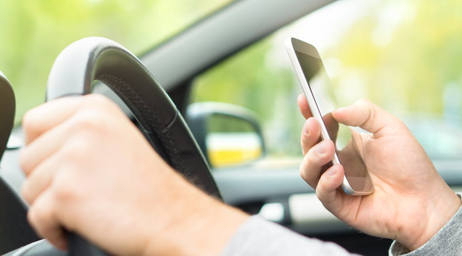 Driver Texting Distracted Driving 103769656 Tero Vesalainen Dreamstime