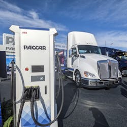 A Paccar Parts EV charging station and an electric Kenworth T680E on the Central Plaza of the Las Vegas Convention Center during CES 2022.