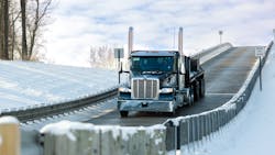 A Peterbilt Model 389, equipped with the TX-12 transmission, hauls 80,000 lb. at Eaton's proving grounds. A Peterbilt Model 389, equipped with the TX-12 transmission, hauls 80,000 lb. at Eaton's proving grounds.