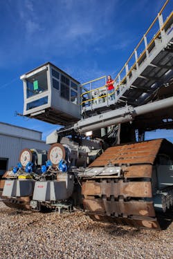 Mechanical engineer Breanne Rohloff stands atop NASA’s Crawler-Transporter 2. Mechanical engineer Breanne Rohloff stands atop NASA’s Crawler-Transporter 2.