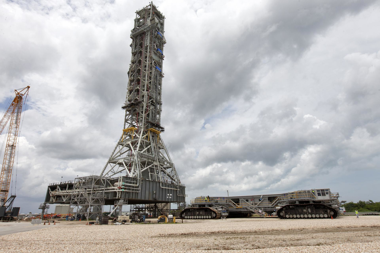 Preparations are underway in this 2018 photo for Crawler-Transporter 2 to move under the mobile launcher at NASA&apos;s Kennedy Space Center.