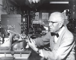 Clessie Cummins in his workshop working on an engine compression brake. Clessie Cummins in his workshop working on an engine compression brake.