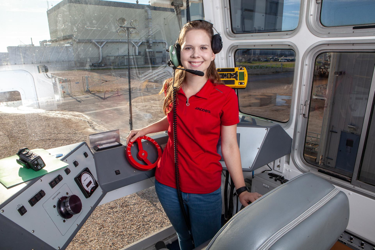 Mechanical engineer Breanne Rohloff, one of the first women to drive a NASA crawler-transporter, inside the cab of CT-2 at Kennedy Space Center in 2019.