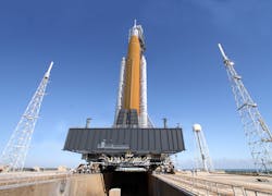 An illustration of the SLS Orion ML on a NASA crawler-transporter at Launch Pad 39B. An illustration of the SLS Orion ML on a NASA crawler-transporter at Launch Pad 39B.
