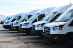 Ford E-Transits outside the Kansas City-area manufacturing plant.