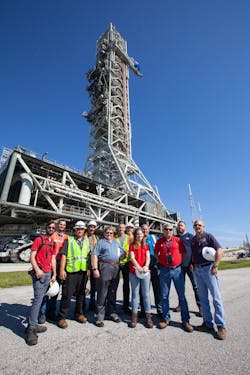 NASA’s Kennedy Space Center crawler team, in front of the agency’s mobile launcher at Launch Complex 39B in Florida on June 27, 2019. NASA’s Kennedy Space Center crawler team, in front of the agency’s mobile launcher at Launch Complex 39B in Florida on June 27, 2019.