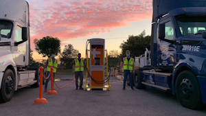 Dtna Electric Trucks Charging With People