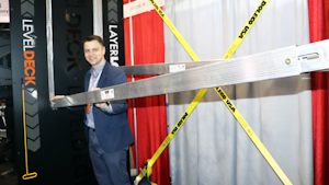 Level Deck inventor Steven Downing demonstrates how the self-leveling beam technology works at TMC 2022 in Orlando.