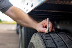 A proper pre-trip inspection involves drivers checking tire pressure before they hit the road. A proper pre-trip inspection involves drivers checking tire pressure before they hit the road.
