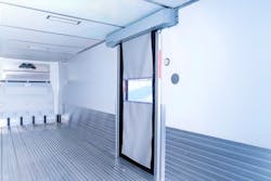 The ASSA ABLOY MD2000 automated reefer door opens with “lightning speed.” The ASSA ABLOY MD2000 automated reefer door opens with “lightning speed.”