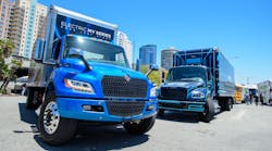 International&rsquo;s eMV, left, and Freightliner&rsquo;s eM2, battery-electric medium-duty trucks on display at ACT Expo 2022 in Long Beach, California.