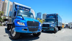 International’s eMV, left, and Freightliner’s eM2, battery-electric medium-duty trucks on display at ACT Expo 2022 in Long Beach, California. International’s eMV, left, and Freightliner’s eM2, battery-electric medium-duty trucks on display at ACT Expo 2022 in Long Beach, California.