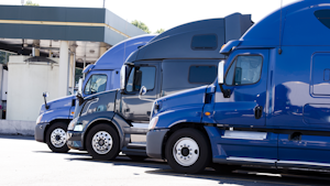 Modern Heavy Trucks At Truck Stop