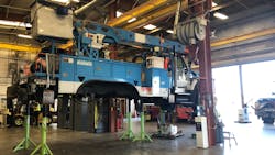 Technicians prepare to work on a PG&E vehicle in Davis, California. Technicians prepare to work on a PG&E vehicle in Davis, California.
