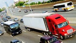 Red Truck In Traffic 62b48ed95fbce Red Truck In Traffic 62b48ed95fbce