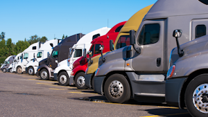 Dreamstime Xxl 104037044 Vitpho Trucks Lined Up