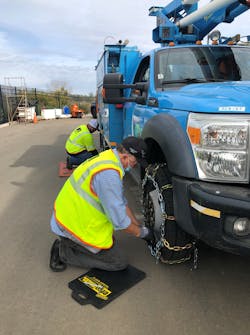 PG&E employees conduct a training exercise to prepare vehicles for adverse weather and road conditions. PG&E employees conduct a training exercise to prepare vehicles for adverse weather and road conditions.