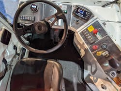 Inside the cab of the Orange EV e-Triever, the OEM's third-generation battery-electric yard tractor. Inside the cab of the Orange EV e-Triever, the OEM's third-generation battery-electric yard tractor.