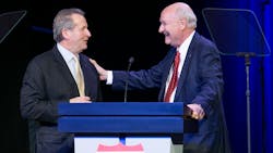 Jim Ward, right, thanks outgoing TCA President John Lyboldt during Truckload 2022, TCA's annual conference, held in Las Vegas in March. Jim Ward, right, thanks outgoing TCA President John Lyboldt during Truckload 2022, TCA's annual conference, held in Las Vegas in March.