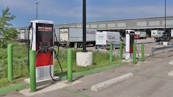 Two Tritium 75-kW DC fast chargers are adjacent to the terminal docks. After a daily run, trained employees drive the vehicles here to charge, and others will retrieve them and return to the dock for loading. Two Tritium 75-kW DC fast chargers are adjacent to the terminal docks. After a daily run, trained employees drive the vehicles here to charge, and others will retrieve them and return to the dock for loading.